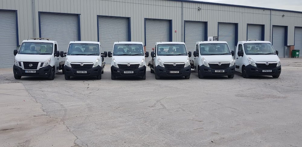 ADAMS RECOVERY photo showing multiple recovery vans